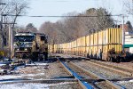 AY-5 passes a ling string of trash containers at Moores